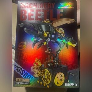 Black and Gold Mechanical Insect Building Set with Segmented Body